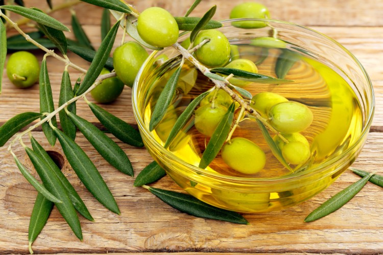 olives and olive oil in bowl